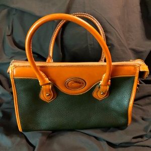 Genuine Dooney and Bourke leather bag.